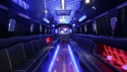 a big party bus fill ed with comfortable seats and shiny bright
